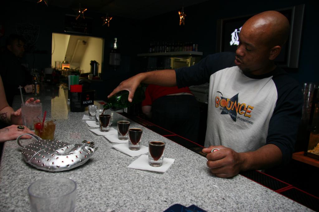 bartender pouring jaegermeister