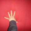 my hand on the padded wall