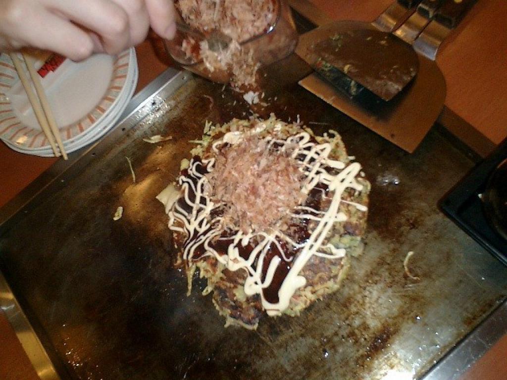 okonomiyaki ready to eat with mayo, unagi sauce and bonito